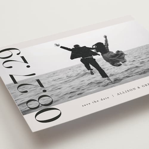 This is a ivory save the date with standard by Pixel and Hank called all stacked up printing on recycled smooth signature in standard