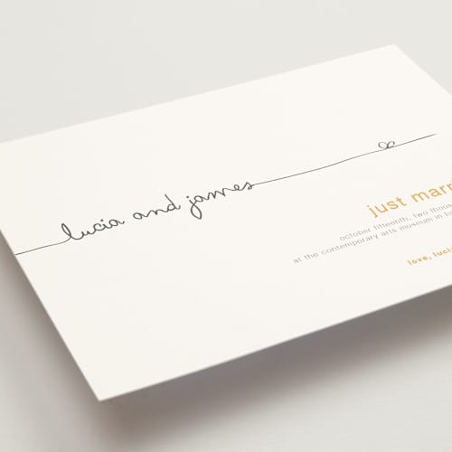 This is a yellow wedding announcements with standard by R studio called the happy couple printing on signature in standard