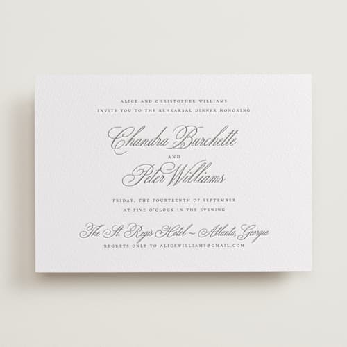 This is a graphite rehearsal dinner invitations with letterpress by Wildfield Paper Co called calligraphie printing on white cotton in standard