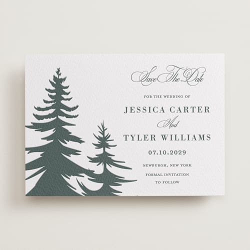 This is a slate save the date with letterpress by Teju Reval called evergreen printing on white cotton in standard