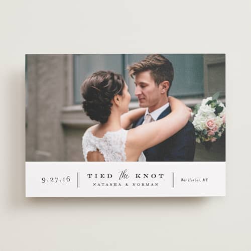 This is a vanilla wedding announcements with standard by Jennifer Wick called bottom line printing on recycled smooth signature in standard