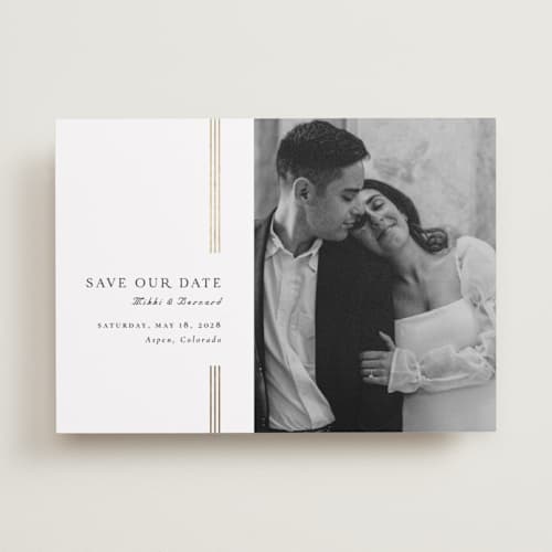 This is a lily foil stamped save the date cards with foil pressed by Orasie called bookmark a new page printing on recycled smooth signature in standard