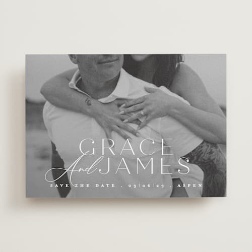 This is a snow save the date with standard by Angela Thompson called namesake printing on recycled smooth signature in standard