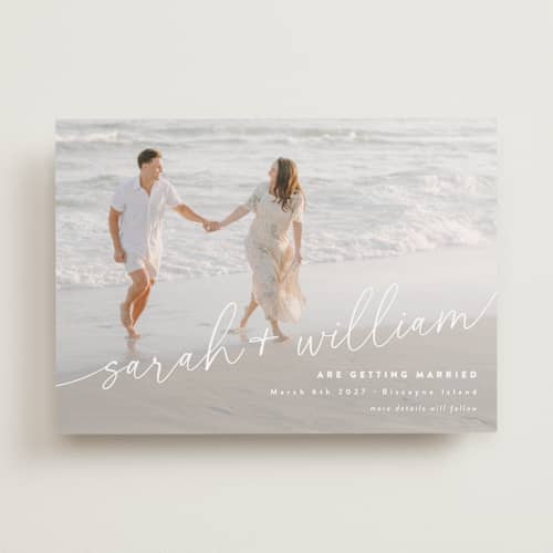 This is a ivory save the date with standard by Jessie Steury called sweet script printing on recycled smooth signature in standard