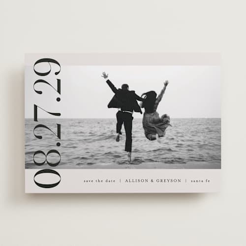 This is a ivory save the date with standard by Pixel and Hank called all stacked up printing on recycled smooth signature in standard