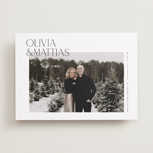 This is a silk save the date with standard by Kelly Schmidt called overlapped printing on recycled smooth signature in standard