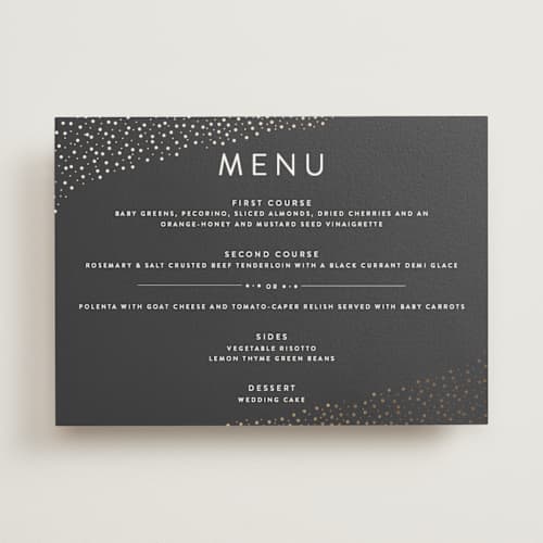 This is a soft black menu cards with foil pressed by Camille Robinson called modern glam printing on signature in standard