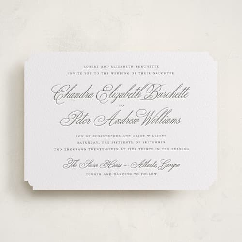 This is a graphite letterpress wedding invitations with letterpress by Wildfield Paper Co called calligraphie printing on white cotton in standard