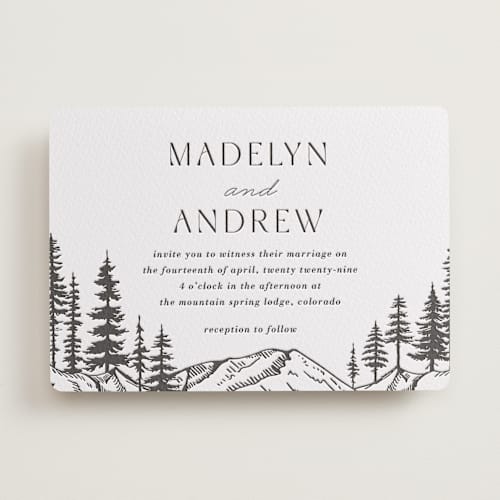 This is a soft black letterpress wedding invitations with letterpress by Winston Latchman called mountain pines printing on white cotton in standard