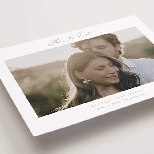 This is a dusty blue save the date with standard by Stacey Meacham called modern air printing on recycled smooth signature in grand