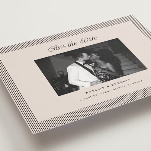 This is a noir save the date with standard by Pixel and Hank called linea printing on recycled smooth signature in grand