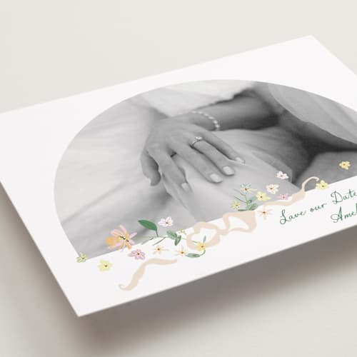 This is a spring save the date with standard by Phrosné Barwood called spring draped garland printing on recycled smooth signature in grand
