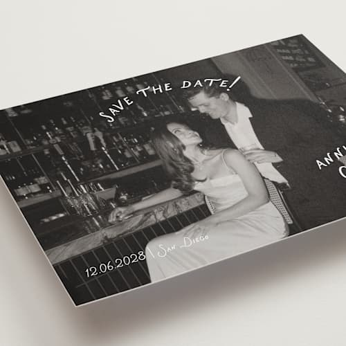 This is a ivory save the date with standard by Stephanie Heinrich Godbout called lovers printing on recycled smooth signature in grand