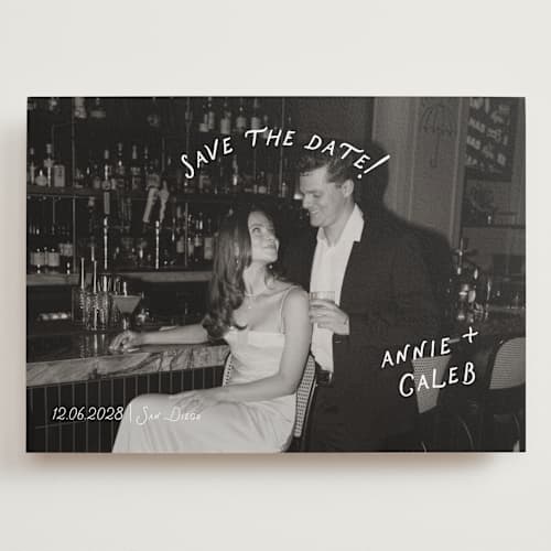 This is a ivory save the date with standard by Stephanie Heinrich Godbout called lovers printing on recycled smooth signature in grand