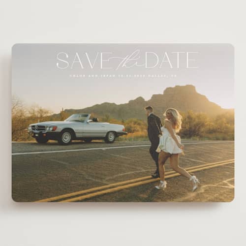 This is a ivory save the date with standard by Maja Cunningham called prose printing on recycled smooth signature in grand