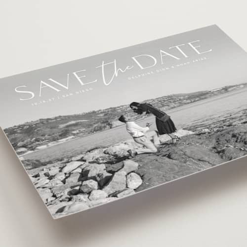 This is a moonstone save the date postcards with standard by Olivia Raufman called breathtaking printing on signature in postcard