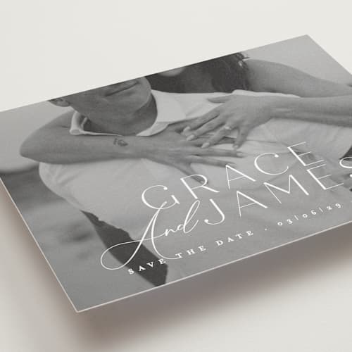 This is a snow save the date postcards with standard by Angela Thompson called namesake printing on signature in postcard