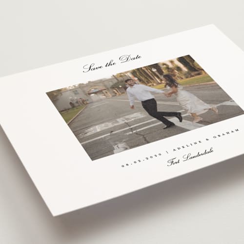 This is a snow save the date postcards with standard by Pixel and Hank called minimal printing on signature in postcard
