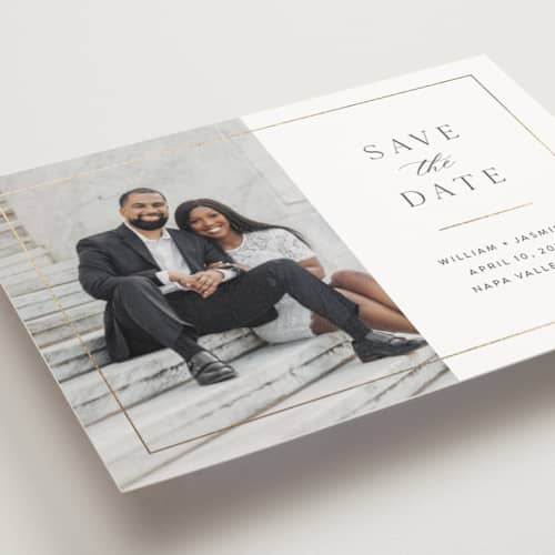 This is a cloud save the date postcards with foil pressed by Christie Garcia called classico printing on signature in postcard