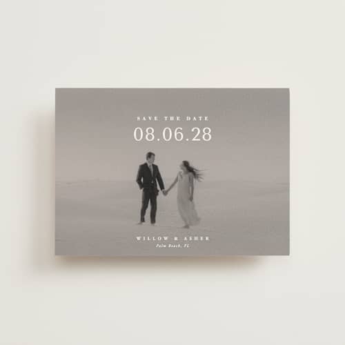 This is a moonstone petite save the dates with standard by Lucrecia Caporale called classic big date printing on recycled smooth signature in petite