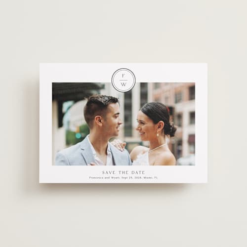 This is a cotton petite save the dates with standard by Stacey Meacham called circle monogram printing on recycled smooth signature in petite