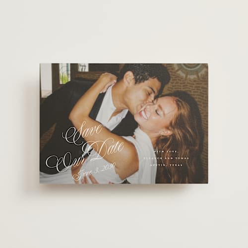 This is a pearl save the date postcards with standard by Leah Bisch called scripted date printing on signature in postcard