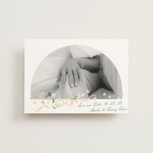This is a spring save the date postcards with standard by Phrosné Barwood called spring draped garland printing on signature in postcard