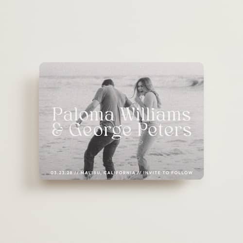 This is a powder petite save the dates with standard by Megan Davis called faded printing on recycled smooth signature in petite