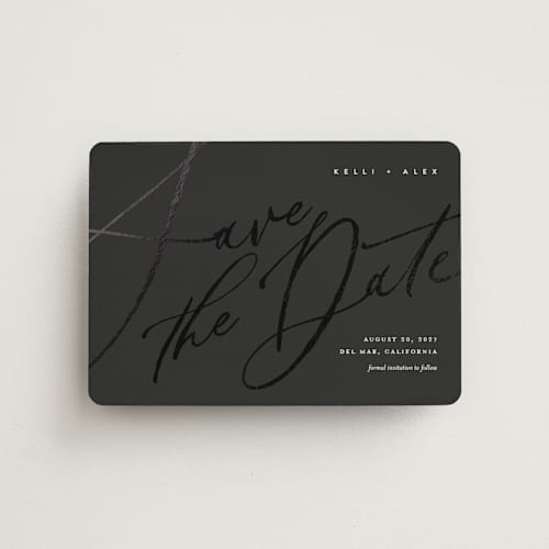 This is a noir save the date magnets with foil pressed by Eric Clegg called brush script printing on magnet paper in magnet