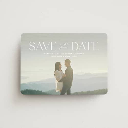 This is a cloud save the date magnets with standard by Kate Ahn called monterosso printing on magnet paper in magnet