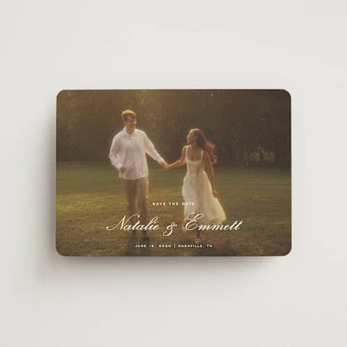 This is a ivory save the date magnets with standard by Emily Betts called story printing on magnet paper in magnet