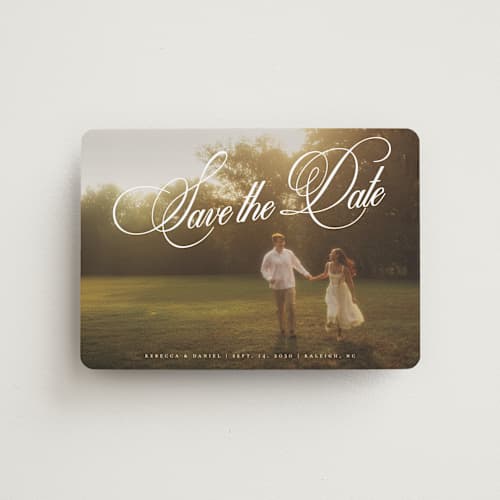 This is a porcelain save the date magnets with standard by Orasie called vintage elegant printing on magnet paper in magnet