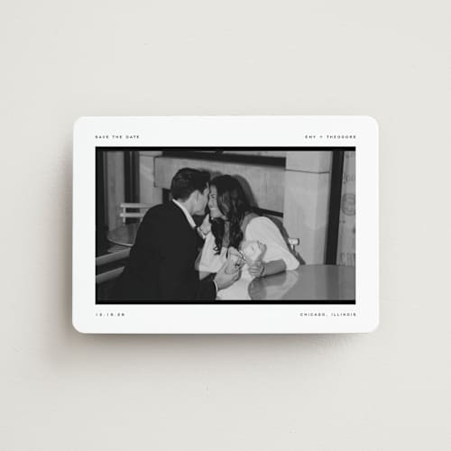 This is a onyx save the date magnets with standard by Pixel and Hank called photosnap printing on magnet paper in magnet