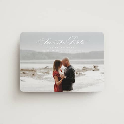This is a cloud save the date magnets with standard by Ashlee Townsend called enchanted love printing on magnet paper in magnet