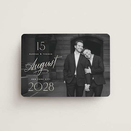This is a ivory save the date magnets with standard by Oscar and Emma - Karly Depew called the date is set printing on magnet paper in magnet
