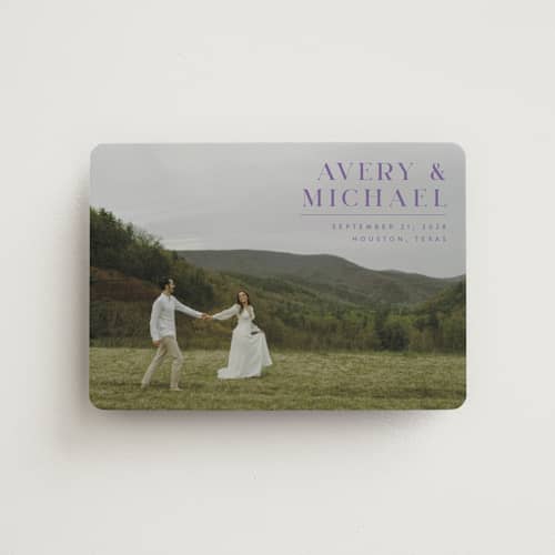 This is a lavender save the date magnets with standard by Juneau Designs called hold tight printing on magnet paper in magnet