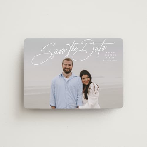 This is a snow save the date magnets with standard by Lauren Chism called sweetest love printing on magnet paper in magnet