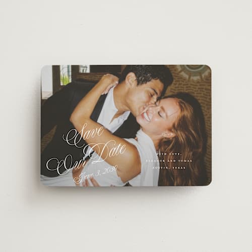 This is a pearl save the date magnets with standard by Leah Bisch called scripted date printing on magnet paper in magnet