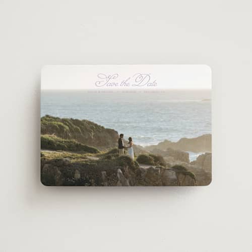 This is a lilac save the date magnets with standard by Casey Miller called quiet horizon printing on magnet paper in magnet