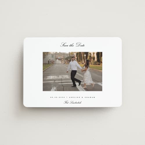 This is a snow save the date magnets with standard by Pixel and Hank called minimal printing on magnet paper in magnet