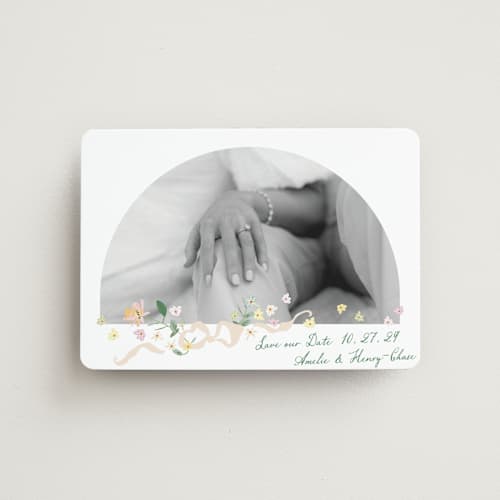 This is a spring save the date magnets with standard by Phrosné Barwood called spring draped garland printing on magnet paper in magnet