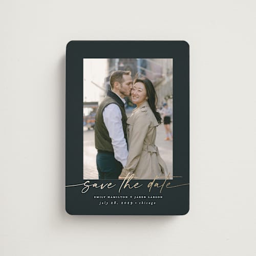 This is a midnight save the date magnets with foil pressed by Nicole Walsh called wrapped printing on magnet paper in magnet