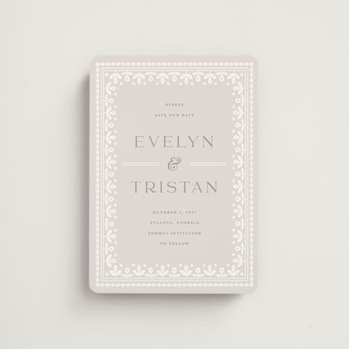 This is a cream save the date magnets with standard by Kristen Smith called lace trim printing on magnet paper in magnet