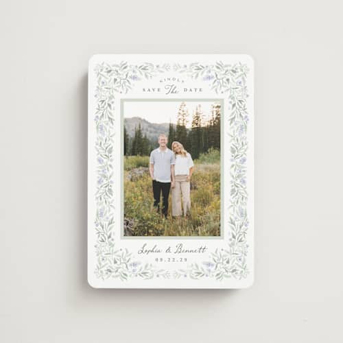 This is a periwinkle save the date magnets with standard by Kristen Smith called delicate vines printing on magnet paper in magnet