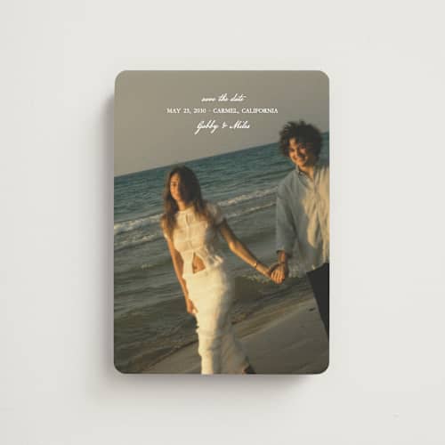 This is a snow save the date magnets with standard by Kate Ahn called alma printing on magnet paper in magnet