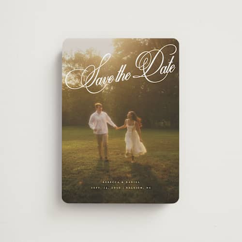 This is a porcelain save the date magnets with standard by Orasie called vintage elegant printing on magnet paper in magnet
