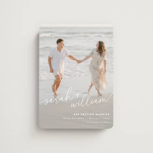 This is a ivory save the date magnets with standard by Jessie Steury called sweet script printing on magnet paper in magnet