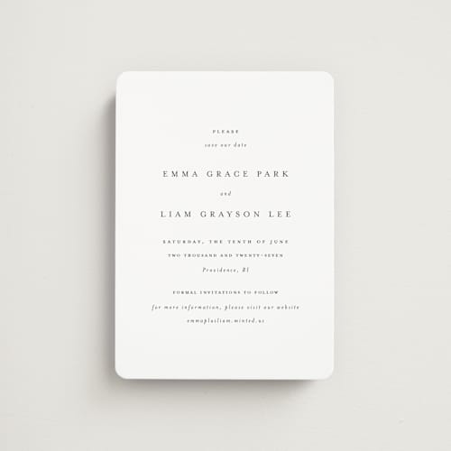 This is a classic white save the date magnets with standard by Design Lotus called a thousand years printing on magnet paper in magnet