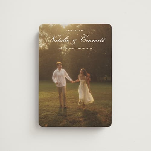 This is a ivory save the date magnets with standard by Emily Betts called story printing on magnet paper in magnet
