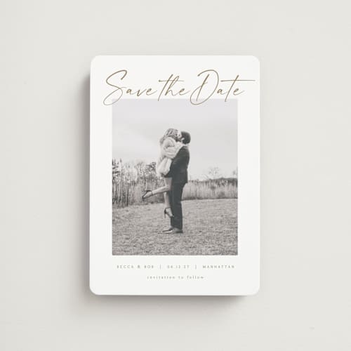This is a ivory save the date magnets with standard by AK Graphics called flash dance printing on magnet paper in magnet